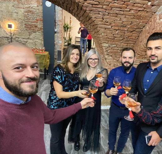 The Mejix development team collaborating in an office.