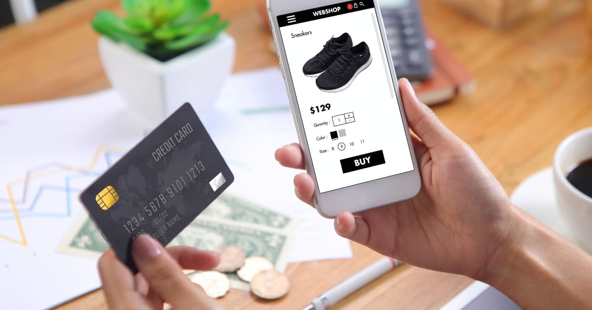 A woman making a payment on an e-commerce app.