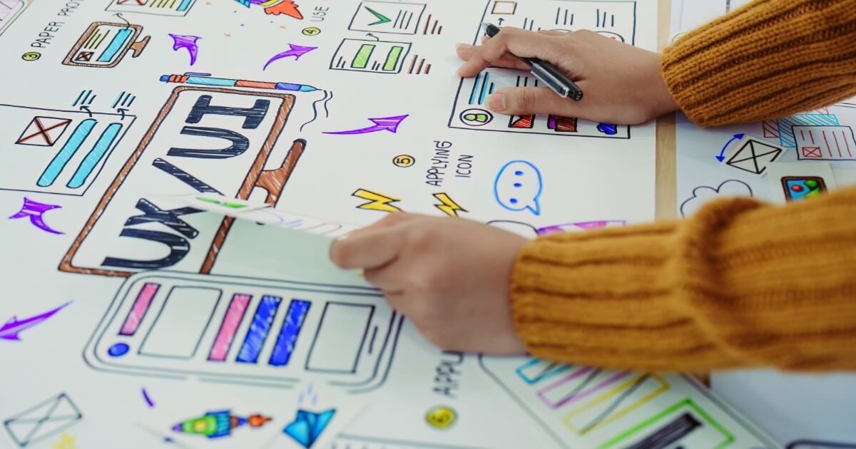 A person using a laptop, illustrating the importance of digital user experience.