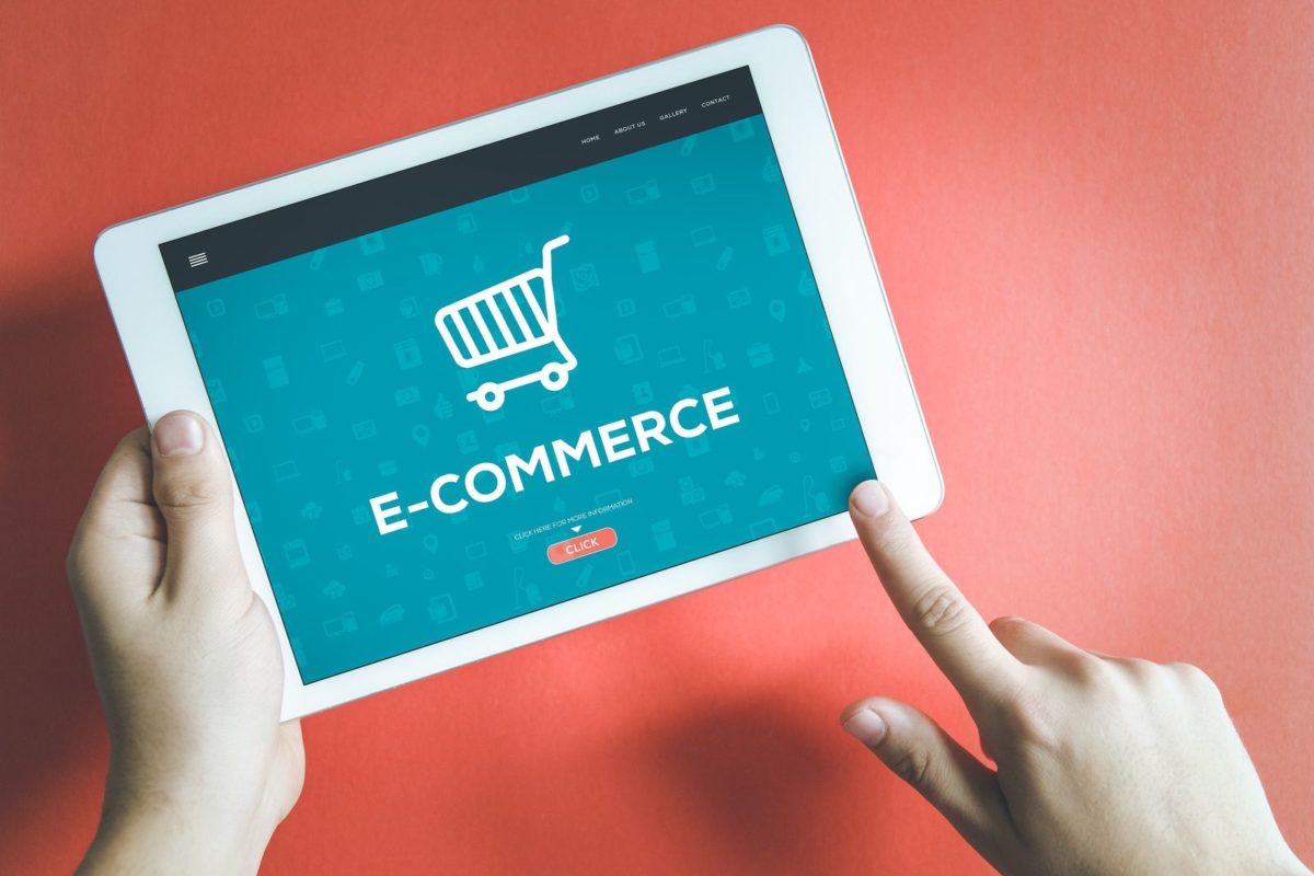 A person using a laptop to shop online, illustrating the convenience of ecommerce.